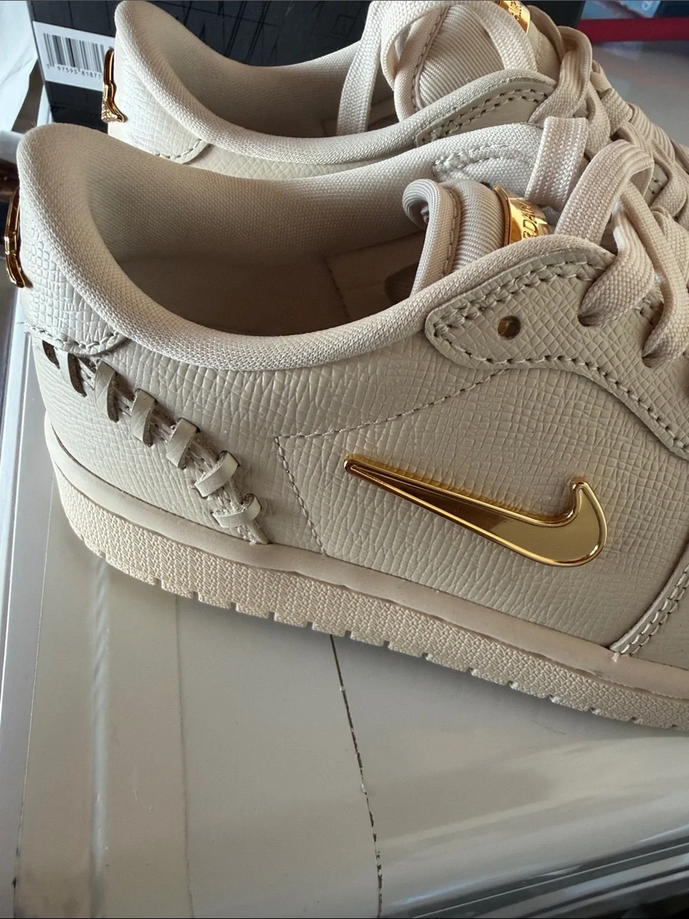 Nike Men’s Tan Low-Top Sneakers with Gold Swoosh